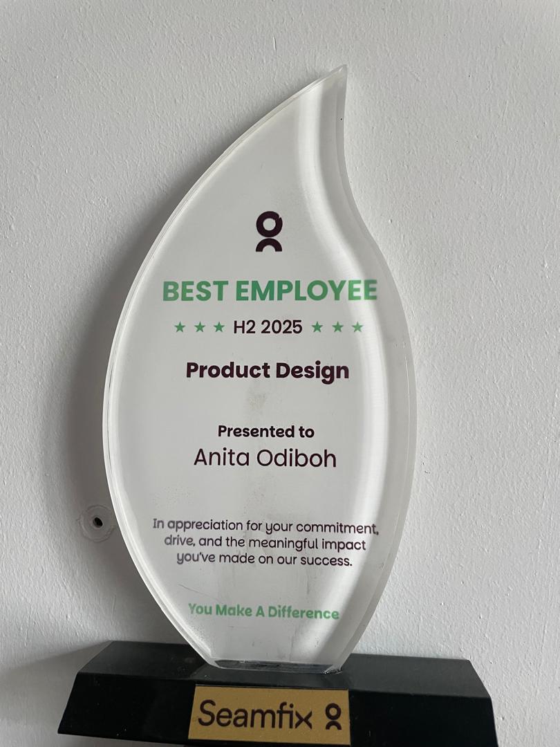 Seamfix Best Employee award plaque for Product Design, H2 2025, presented to Anita Odiboh